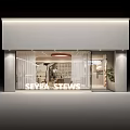 Modern Specialty Store Interior Featuring Round Pendant Light Staircase Plants And Display Wall