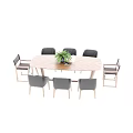 Mariani 60th Modern Wooden Dining Table And Black Chairs With Decorative Plants