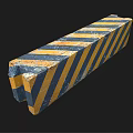 Concrete Road Barrier With Blue Yellow Diagonal Stripes And Worn Surface
