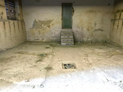Old Unfinished Basement With Peeling Walls Green Door And Stained Floor Drain 3d model
