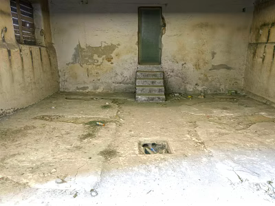 Old Unfinished Basement With Peeling Walls Green Door And Stained Floor Drain 3d model