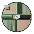Round Rug in Beige Green Black with Geometric Lines and Book on White Statue Base