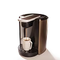 Black and Gold Coffee Maker Brewing Coffee with White Mug in Kitchen