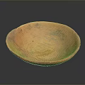 Artisanal Hand Carved Orange Clay Bowl With Intricate Decorative Surface Patterns And Smooth Edges