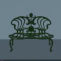 Green Cast Iron Public Bench With Ornate Curved Patterns And Classic Design