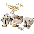 Soft Folded Towels With Scented Bottles Candles Soap And Decorative Leaves Vase
