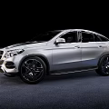 Sleek Silver SUV Coupe With Modern Aerodynamic Design Black Alloy Wheels And Streamlined Body