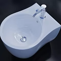 Contemporary White Ceramic Bathroom Washbasin With Sleek Design And Silver Faucet