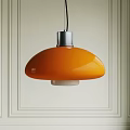 Orange Glass Pendant Light With Silver Metal Top Hanging On Light Colored Paneled Wall