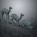 Gray Camel Figurines In Different Poses Standing And Kneeling On Dark Background