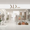 Modern Mall Clothing Counter With Stylish Hanging Clothes Metal Racks And Bright Lighting