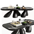 Modern Unique Design Coffee Table Featuring Black Curved Legs Marble Top and Decorative Books Plants