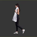 Woman in Black Workout Leggings and Top with White Towel Over Shoulders