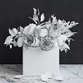 Glass Vase With Peach Roses Green Leaves Silver Foliage And Yellow Fruits On Marble Surface