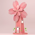 Pink Windmill House With Petal Blades Red Body Windows Door And Small Base Plants