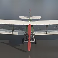 Vintage Biplane Fighter Model with Green Body Red Propeller and Wing Roundels