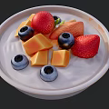 Fresh Fruit Platter With Strawberries Blueberries And Mango Cubes On White Plate