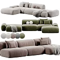 Plush Sectional Sofa in Neutral and Green Tones with Soft Cushions and Throw Blanket