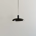 Modern Black Dome Shaped Pendant Light Hanging Against Light Colored Wall 3d model