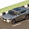 Stylish Silver BMW SUV Exterior Design On Road With Grass Side