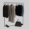 Stylish Modern Wardrobe Display With Hanging Coats Suits And Leather Handbag