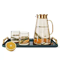 Elegant Glass Tea Set with Gold Handles Dark Tray Lemon Slices and Rosemary