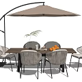 Modern Outdoor Table Setup With Arched Umbrella Chairs Fruits And Green Plant