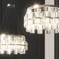 Two Modern Crystal Chandeliers Hanging With Illuminated Glass Shades In Interior