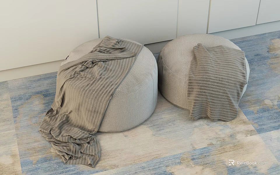 Round Gray Ottoman Poufs with Brown Blanket on Beige Blue Patterned Carpet and White Cabinet 3d model 