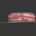 Fresh Red Sausages Packaged In Transparent Plastic Bag On Black Background