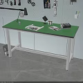 Practical Functional Desk With Green Tabletop White Legs Lamp Magazines Books And Pegboard Wall