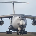 Military Fighter Jet With Four Engines Wide Wings And Landing Gear On Runway