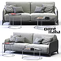 Modern Gray Two Seater Sofa With Multiple Pillows And Round Glass Coffee Tables
