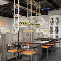 Industrial Modern Restaurant Interior With Concrete Walls Metal Lights And Orange Chairs