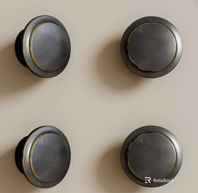Round Black Knobs With Gold Trim Mounted On Light Background Wall 3d model 
