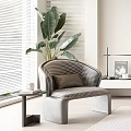 Modern Checkered Upholstered Accent Chair With Cushion Near Large Plant And Side Table By Blinds
