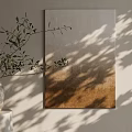 Abstract Painting With Neutral Gradient Tones On Light Colored Wall With Olive Branch Shadow