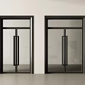 Two Black Framed Glass Entrance Doors With Sleek Design Metal Handles White Wall Gray Floor