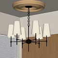 Modern Chandelier With Multiple White Fabric Shades And Black Metal Frame Hanging From Ceiling