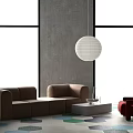 Modern Beige Modular Sofa And Minimalist Coffee Table Set With Curved Design And Geometric Rug
