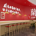 Bright Modern Restaurant Interior With Red Walls Wooden Tables And Pendant Lights