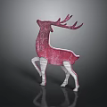 Red and white decorative textured deer figurine on gray background with reflection
