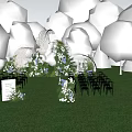 Outdoor Wedding Floral Display with White Blue Blooms Green Foliage and Welcome Sign