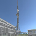 Tall Modern TV Tower With Steel Lattice Structure Standing Against Clear Blue Sky