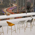 Modern Bar Counter With High Stools And City Night View Through Large Windows