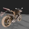 Sleek Golden And Black Sporty Motorcycle With Shiny Body And Wheels