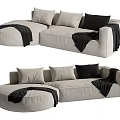 Beige L Shaped Double Sofa with Black Pillows and Soft Blanket 3d model