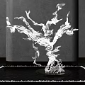 Transparent Glass Sculpture with Branch Like Structure and Flying Birds in Water Feature Under Spotlight
