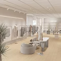 Modern Clothing Store Interior With Clothing Racks Mannequins Sofa And Green Plants