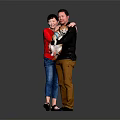Couple Holding Dog In Studio Portrait